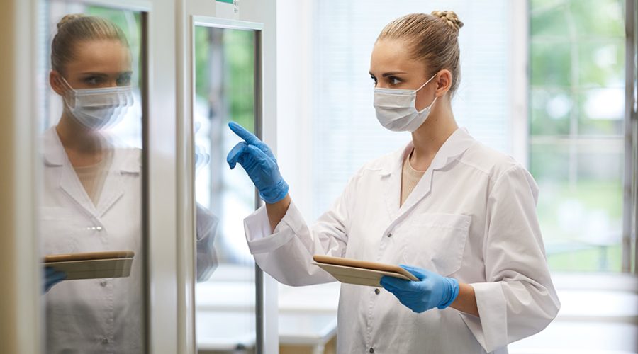 Doctor using tablet at work